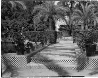 Maria Louisa Park, view of checkerboard tiled steps leading to a greenhouse, Seville, Spain, 1929