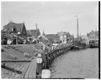 Stores and sailboats on the waterfront, Holland, 1929