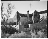 Bettye K. Cree studio, exterior view with palapas, Palm Springs, 1930