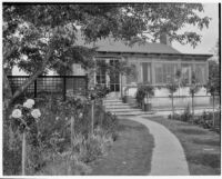 A. G. Mersy residence, back yard with rose standards and lawn, Pasadena, 1933