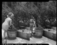 Three-year-old Rosita Dee Cornell playing in a sandbox, California, 1934