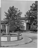 Leo V. Youngworth residence, view across entry court towards tiled fountain and house, Baldwin Hills, 1932