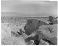 General view of boulders and a desert expanse beyond, Salton Sea vicinity, 1923