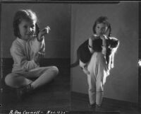 Rosita Dee Cornell holding a housecat, California, 1935