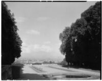 Parc de Saint-Cloud, view of a fountain and two rows of small plants, Saint-Cloud, France, 1929