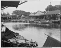 Wharf with fishing boats and fish market, Hawaii, 1928