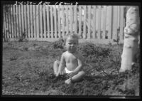 Baby Rosita Dee Cornell sitting outside in a diaper, California, 1932