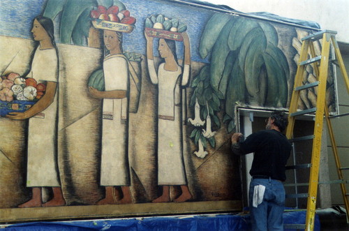 After all five panels of the El Dia del Mercado mural by Alfredo Ramos Martinez are set in place each re-joined seam and edge had to be in-filled and painted, Coronado, 2005