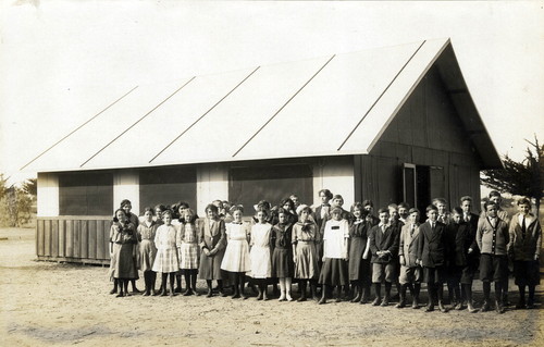 Coronado’s seventh grade class stands in front of temporary classroom 1912 – 1913