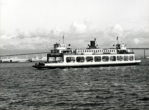 The end of an era, one of the last ferries to transport automobiles crosses the San Diego Bay, 1969