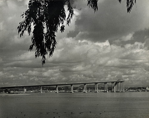 View of the San Diego-Coronado Bay Bridge from the Coronado golf course, c. 1970