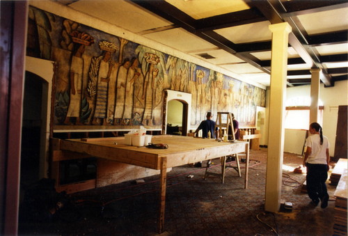 48 foot long El Dia del 1938 Mercado mural being prepared for removal from La Avenida Cafe, Coronado