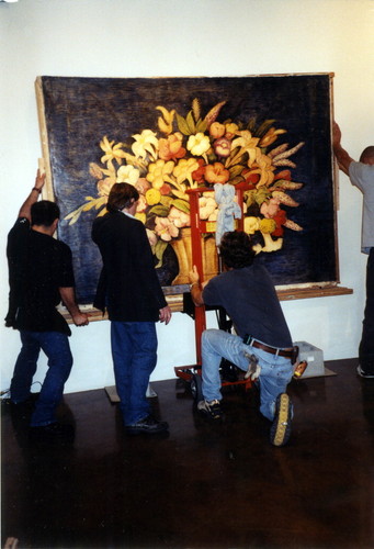 In excess of 1500 pounds the 1938 Canasta de Flores mural by Ramos Martinez is crated and prepared for shipping from the Los Angeles Design Center to the Coronado Public Library. Los Angeles, 2001