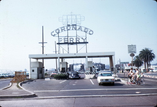 Cars enter the toll plaza of the San Diego and Coronado Ferry on the San Diego side of the bay, circa 1969