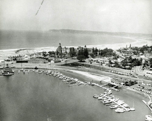 Aerial view of Glorietta Bay looking northwest over yacht club and the Hotel del Coronado, c. 1960