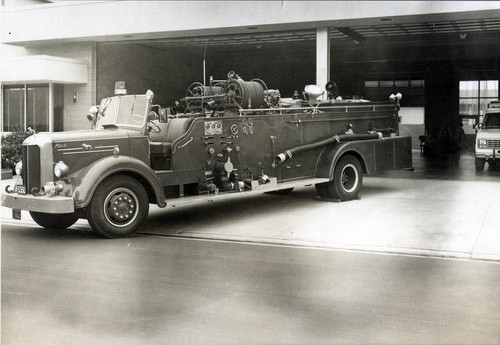 Coronado Fire Department’s 1951 Mack 1000 Quadruple Combination Pumper at the fire station on Sixth and D, c. 1975