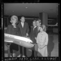 Former Senate secretary, Bobby Baker visiting airplane exhibit with his wife and three children in Los Angeles, Calif., 1964