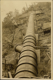 Large pipe (sectioned) coming down a steep slope