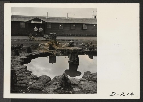 View of the Administration building at this relocation center. Photographer: Stewart, Francis Newell, California
