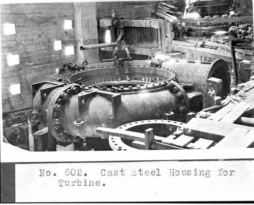 Shop work being done on "cast steel housing" for the turbine