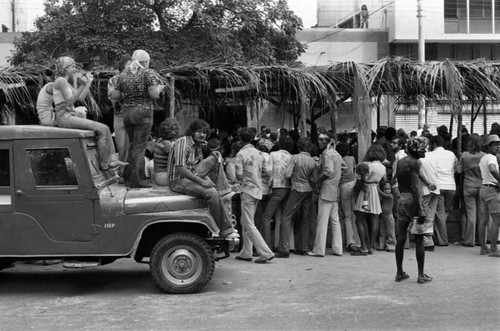 Crowds visiting vendor stands, Barranquilla, Colombia, 1977