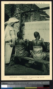 Two girls weaving on a loom, Ouagadougou, Burkina Faso, ca.1900-1930