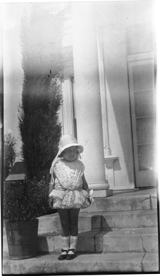 Gloria Pearl Roberts on front steps