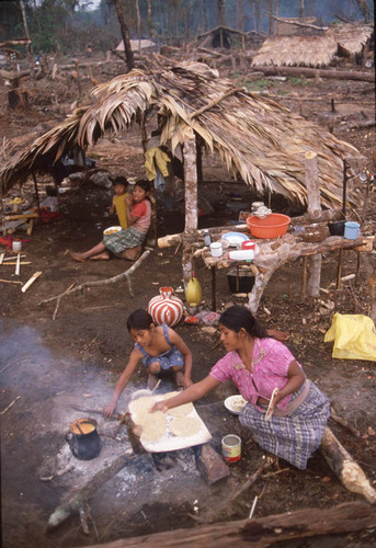 Guatemalan refugees cooking, Chajul, 1983