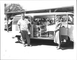 Volkswagen bus filled with copies of the centennial edition of the Argus Courier, Petaluma, California, 1955