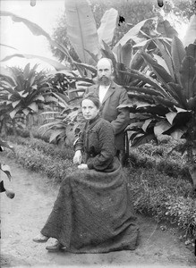 European couple in the garden, Tanzania, ca.1893-1920