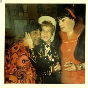 Psychedelic drag, a cowgirl, and Luella in a stole on Halloween, 1970