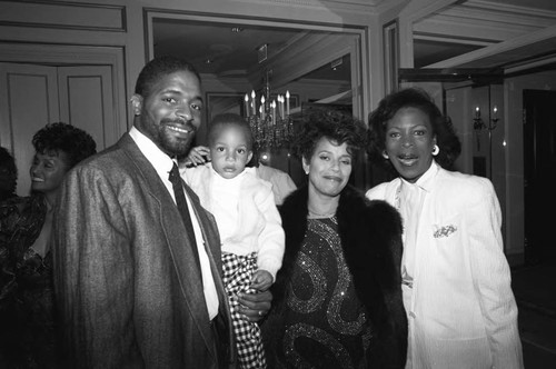 Debbie Allen, Norm Nixon, and Roxie Roker posing together at the Black Emmy nominees dinner, Los Angeles, 1989