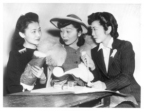 "Loyal Americans All. These Japanese-American girls, born and reared in this country, are doing what they can for this country's victory"--caption on photograph