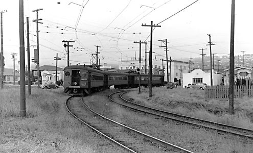 Red train #5 at Madison to Jackson curve — Calisphere