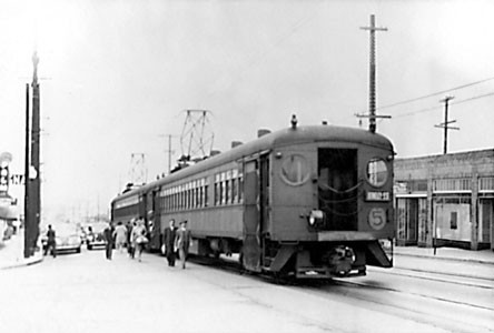 Red train #5 on Solano Avenue