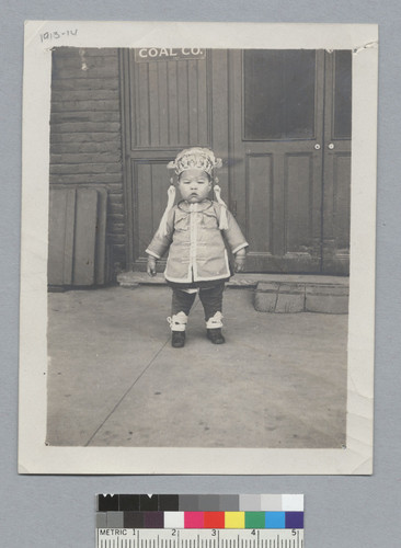[Chinese tot in formal dress]