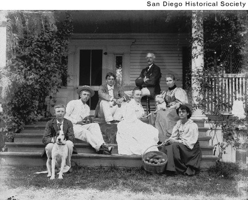 John Kendall and his family(?) on the steps of a house in El Cajon