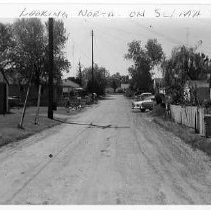 Street scene looking north on Selma Street in North Sacramento, 4-18-1961