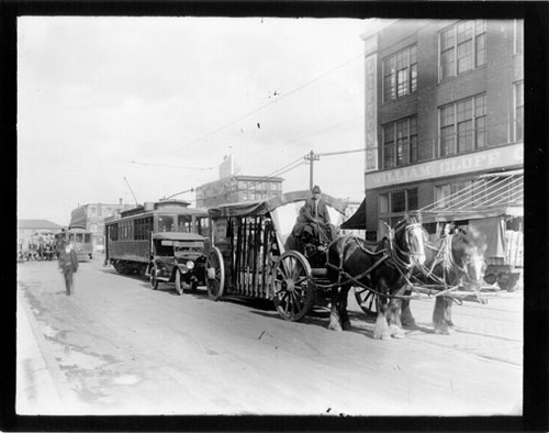 [McNab and Smith Company horse-drawn wagon at Spear and Mission Streets]