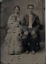 Portrait of Mexican family with infant