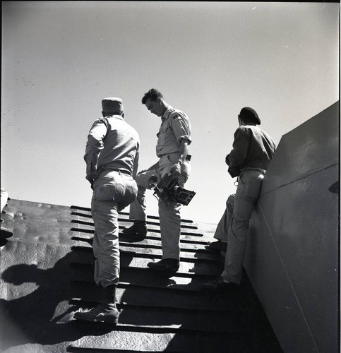 War correspondents on a landing craft