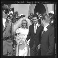 Ricky Nelson and Kristin Harmon, leaving St. Martin of Tours Church after their wedding in Brentwood (Los Angeles), 1963