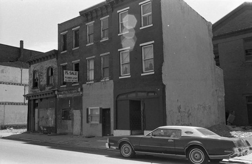 Damaged building for sale, Philadelphia, ca. 1980