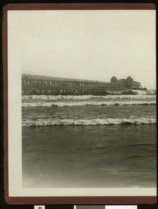Long Beach panoramic view showing breakers and pier, 1924