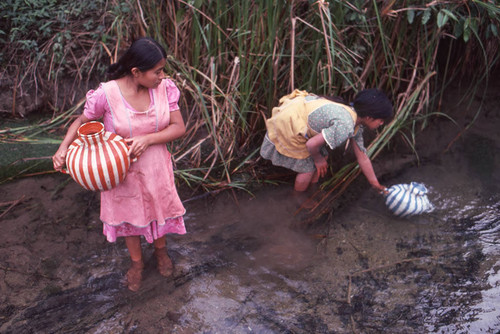 Guatemalan refugees at a river, Cuauhtémoc, 1983