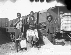 Group of African men in front of trains, Pretoria, South Africa, ca. 1896-1911