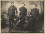 [Studio portrait of five unidentified men]