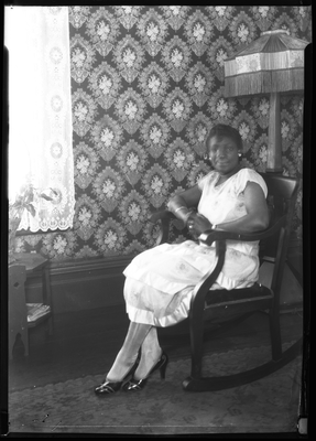 Portrait of a woman sitting in rocking chair