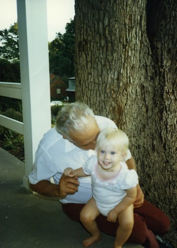 Edward D. Goldberg, with one of his grandchildren. Goldberg was a marine chemist at Scripps Institution of Oceanography. Among his most noted work was his identification of tributyltin as a toxic chemical in marine paint fouling California harbors and in the creation of the 1975 EPA-sponsored Mussel Watch program to observe U.S. coastal marine pollution. October 1986