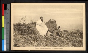 Catholic father teaching the catechism to a young boy, Congo, ca.1920-1940